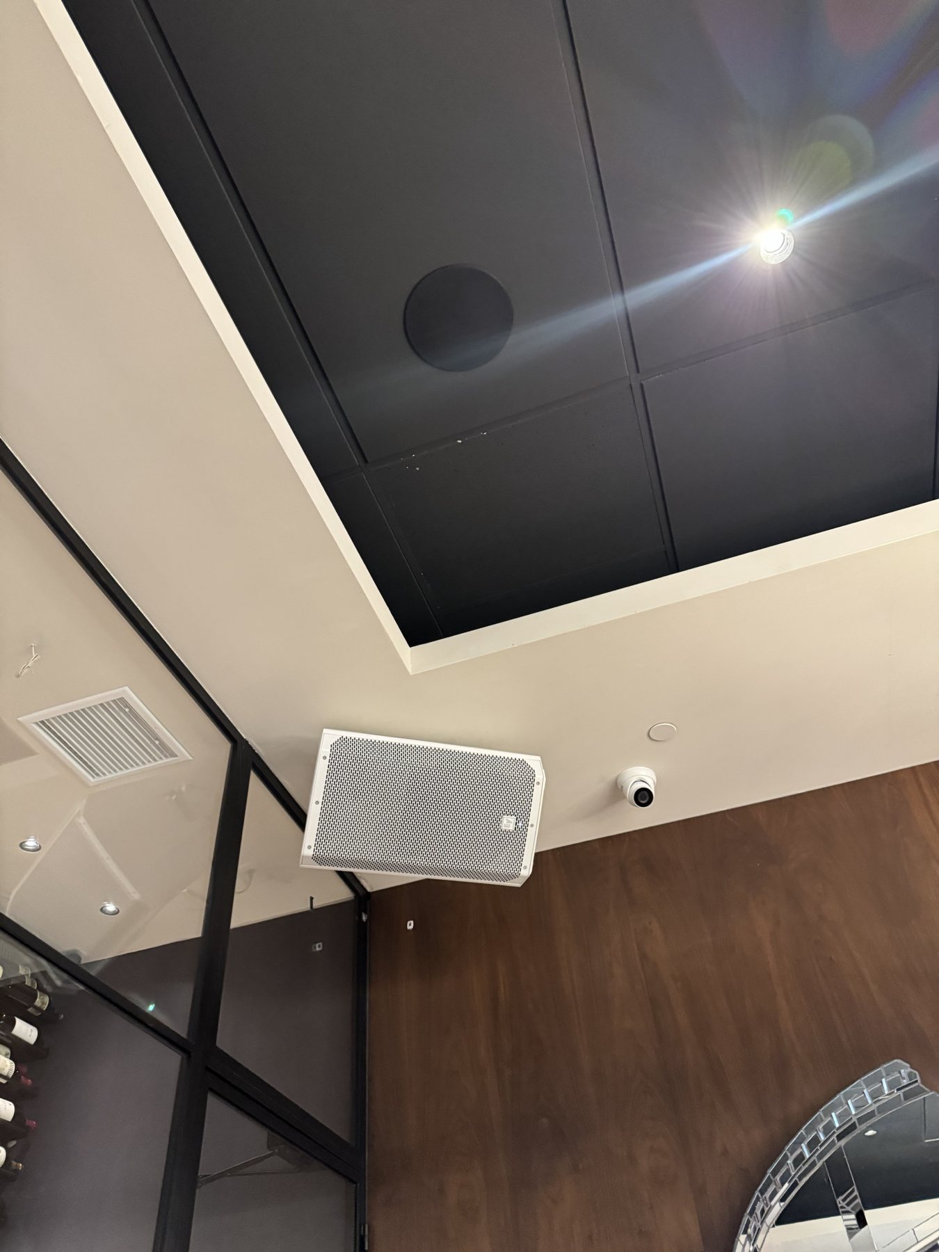 Wall-mounted loudspeaker, ceiling speaker and dome camera installed by Itenco at Zanti Cucina Italiana